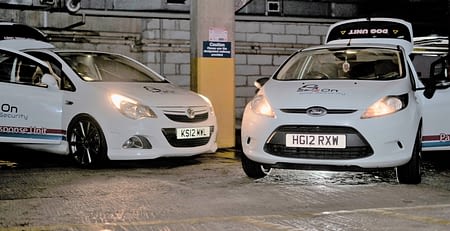two security company cars in car park